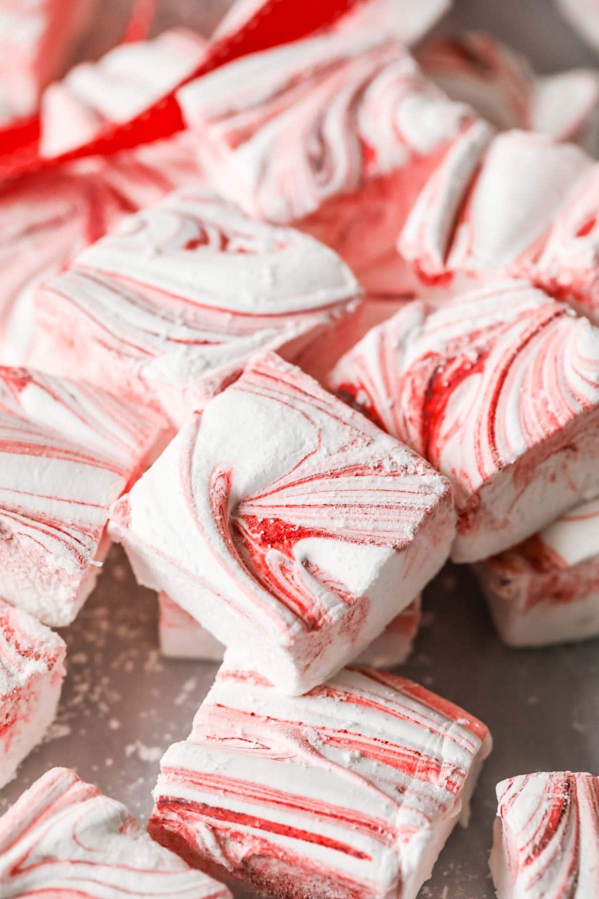 closeup of ared-swirled peppermint marshmallow