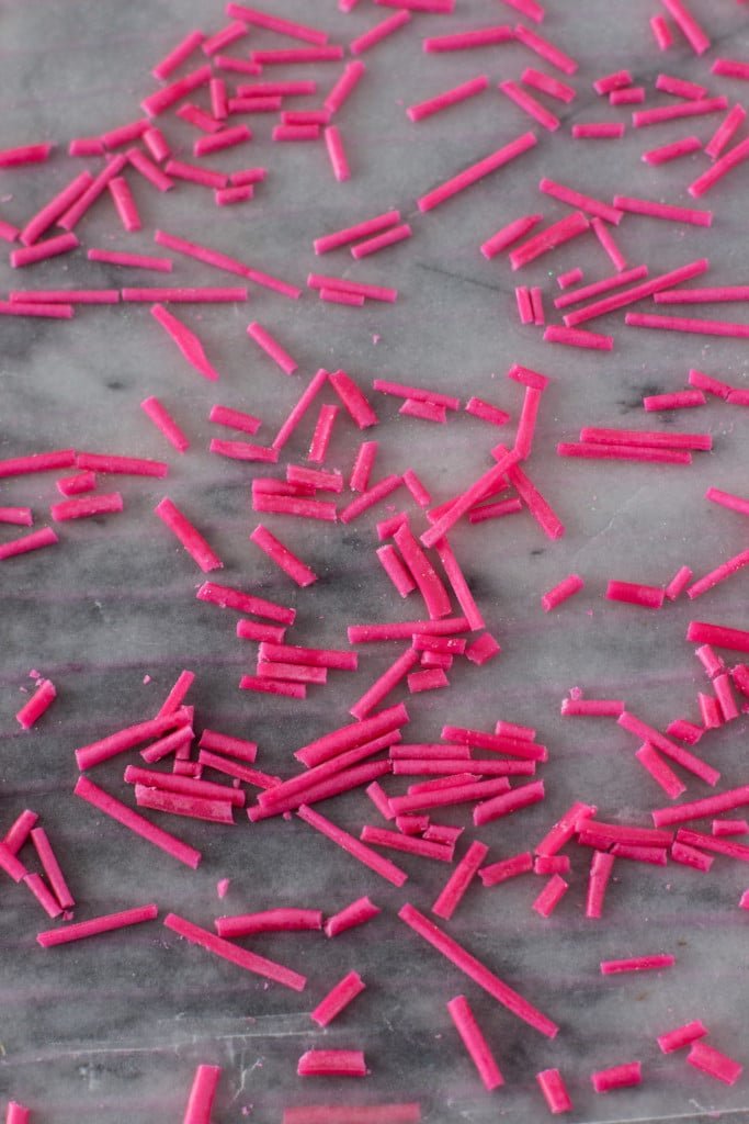 pink homemade sprinkles on marble