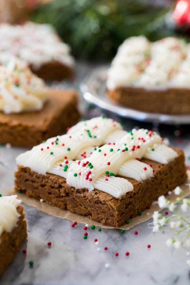 GINGERBREAD COOKIE BARS! Easier than cutting out cookies, and so soft and chewy and good! #gingerbreadcookies #christmasrecipe Gingerbread Cookie bar square with sprinkles