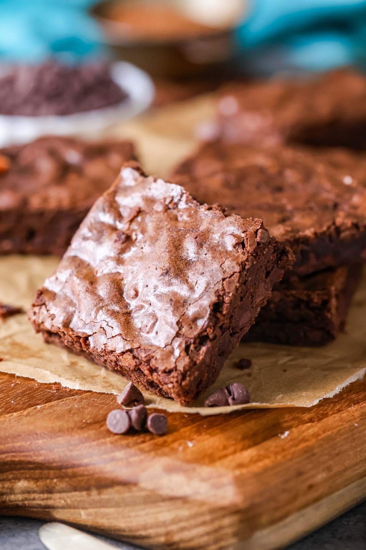 Shiny, crackly topped brownie made from a brownie recipe with cocoa powder.